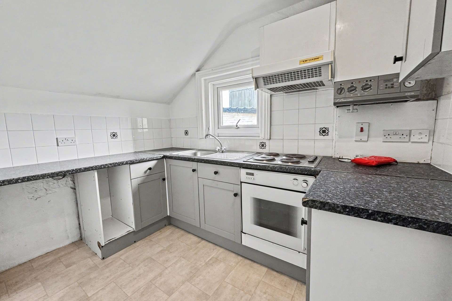 SPACIOUS TWO BEDROOM FIRST FLOOR APARTMENT WITH PARKING